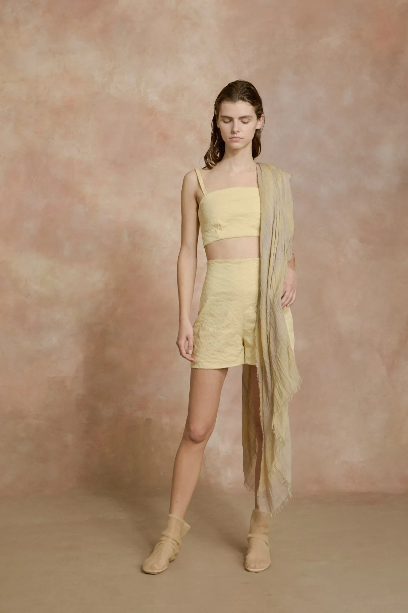 Limon, pale yellow high waisted shorts