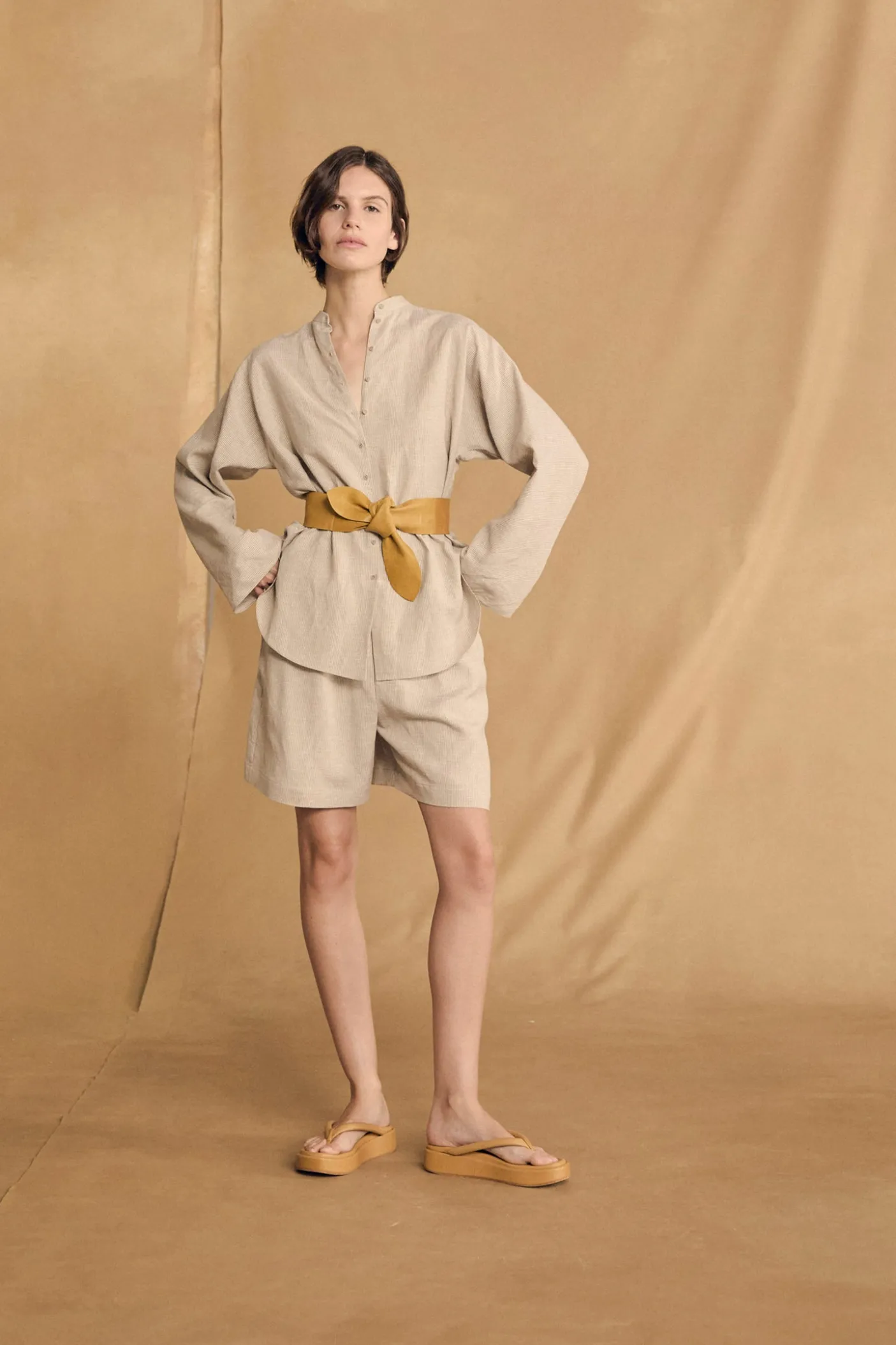 Tilo, gray and brown striped shorts